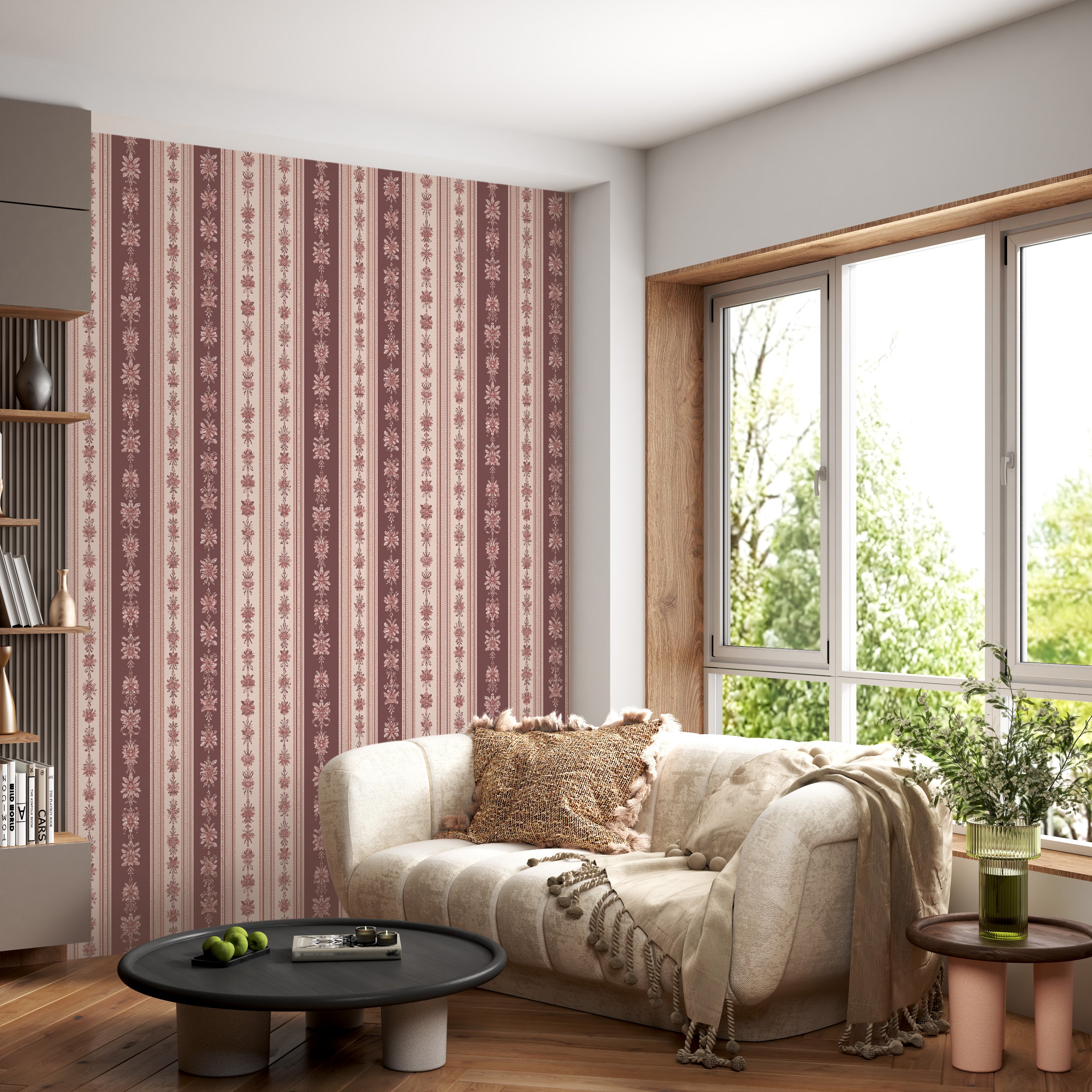 Vintage floral striped wallpaper in dusty rose and cream on a living room accent wall with a cream sofa, warm wood accents