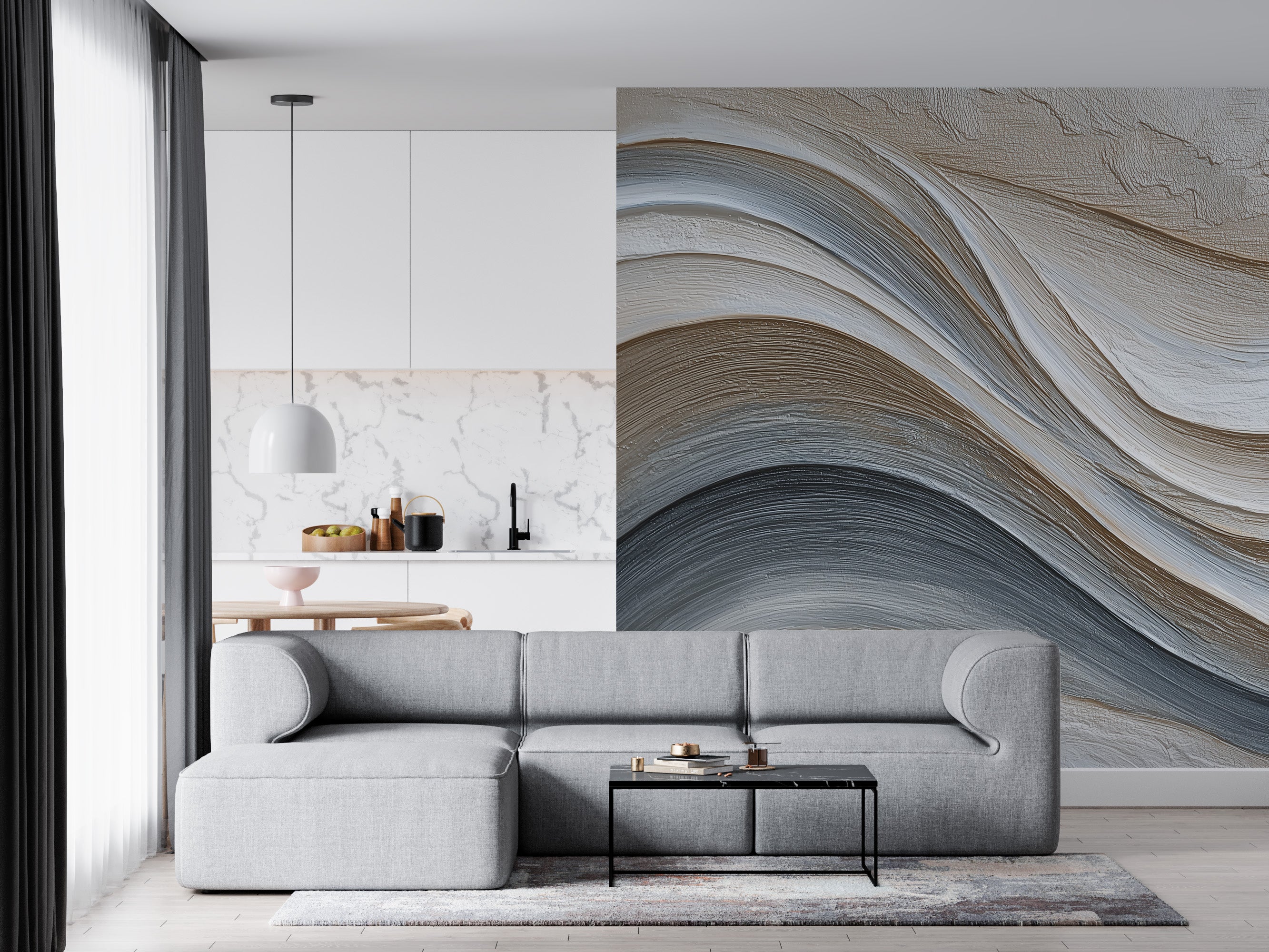 Abstract flowing waves mural in grey beige tones behind a modern living room with a grey sectional sofa, kitchen backdrop