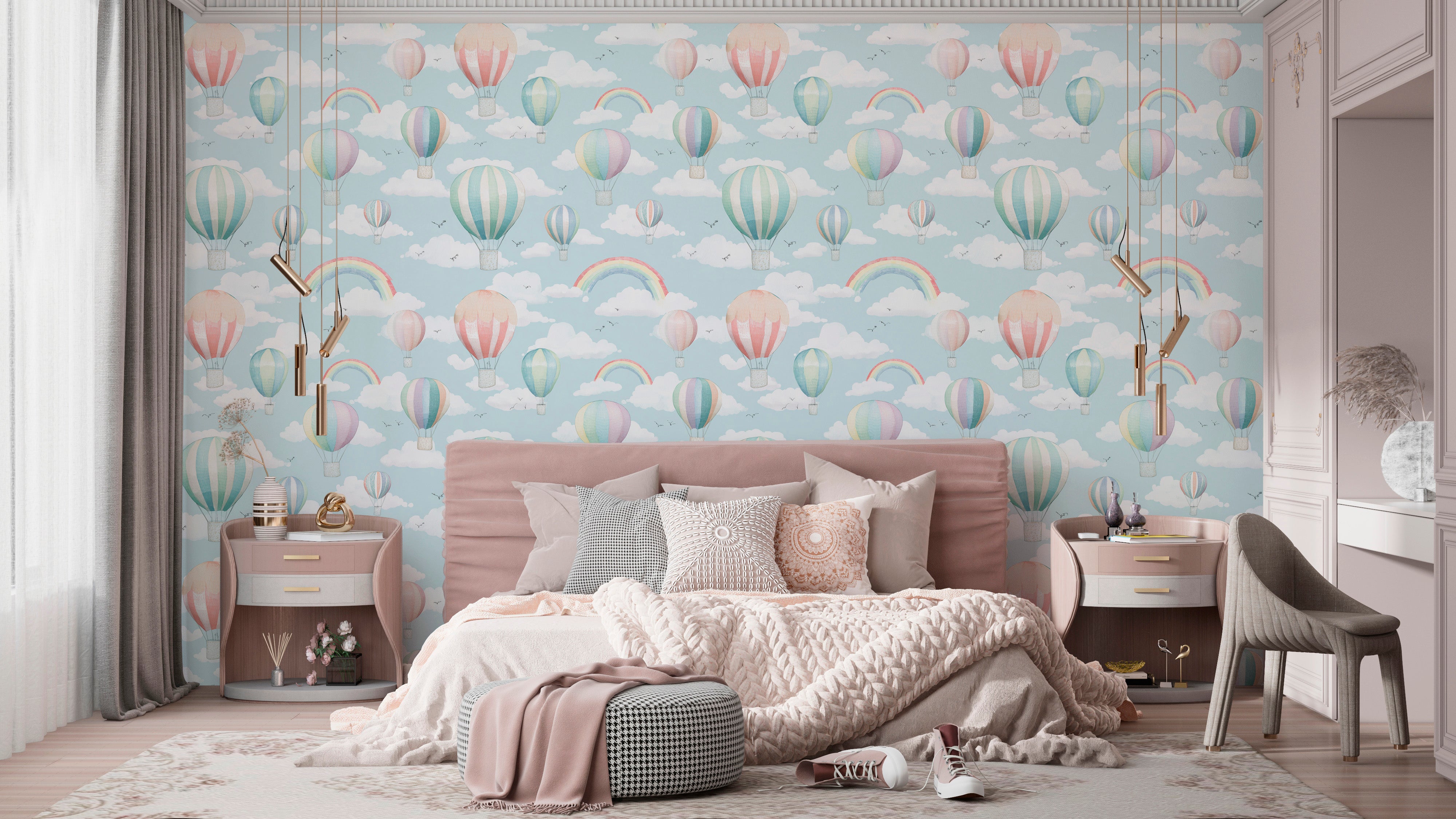 Whimsical hot air balloon wallpaper in pastel blues with clouds and rainbows on a kid’s bedroom wall