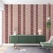 Vintage floral striped wallpaper in dusty rose and cream with damask motifs on vertical stripes, shown in a chic living room