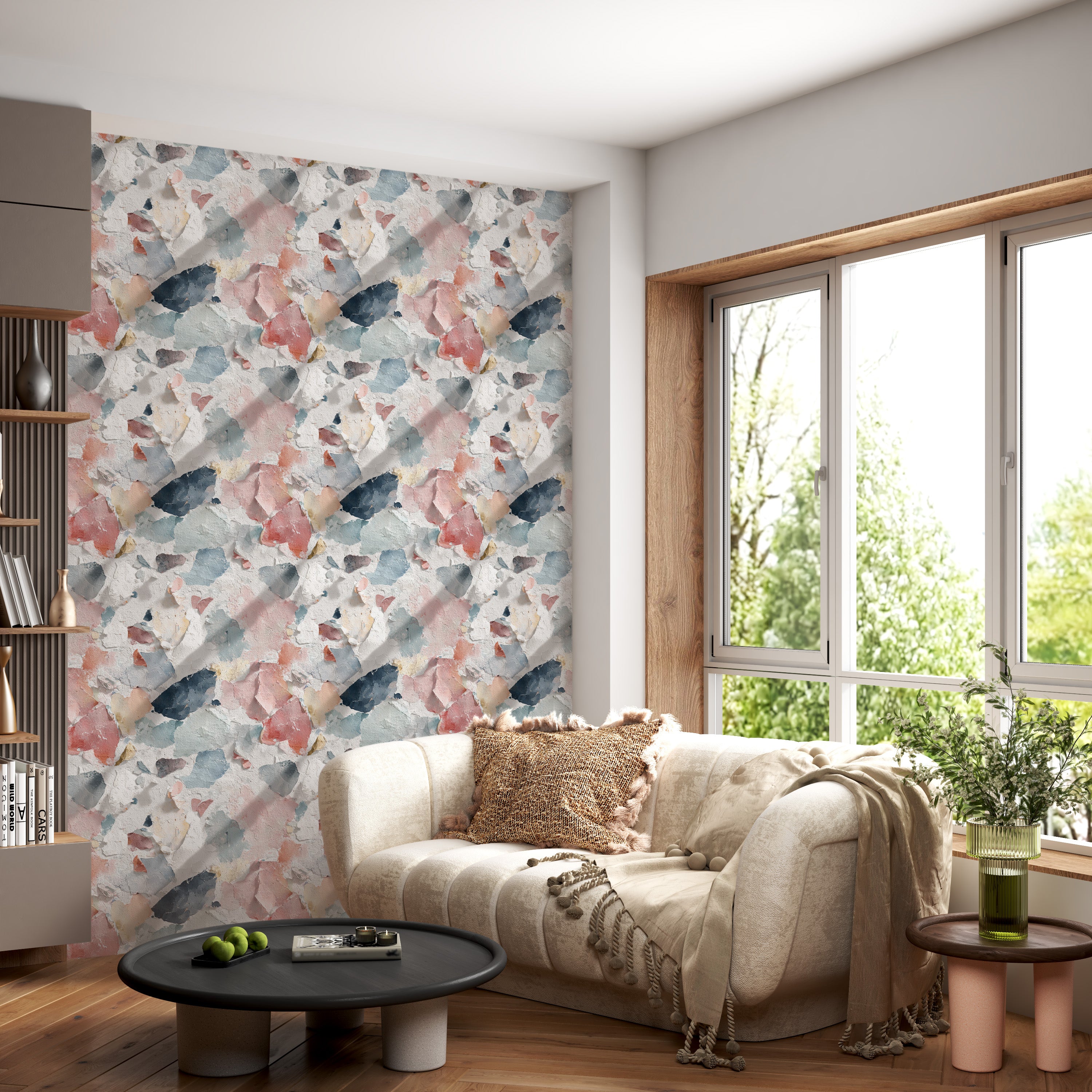 Distressed paint wallpaper in coral blue cream navy tones on a living room feature wall with a cream sofa and large windows