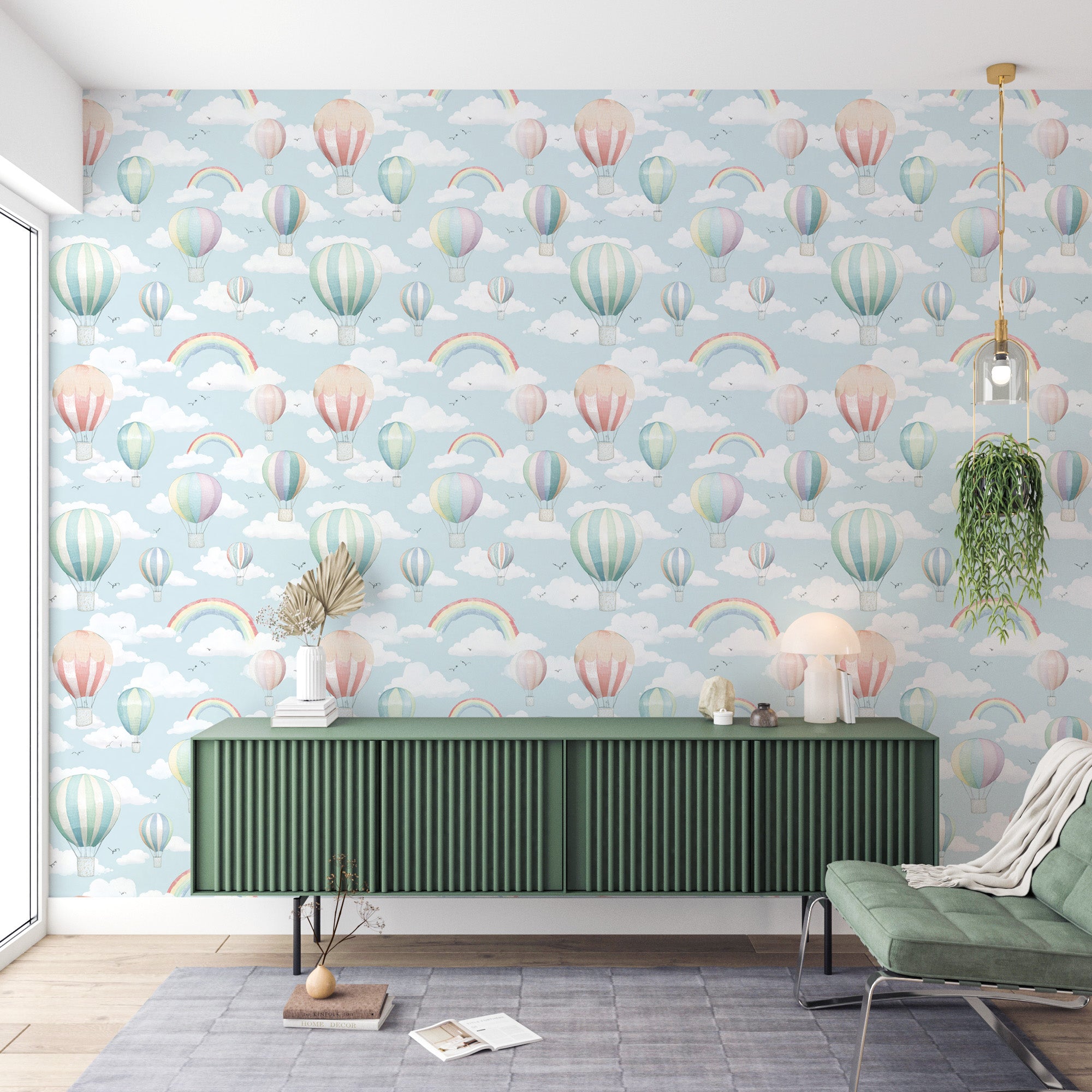 Whimsical light blue wallpaper featuring colorful vintage hot air balloons, fluffy clouds, and rainbows in a dreamy kids room
